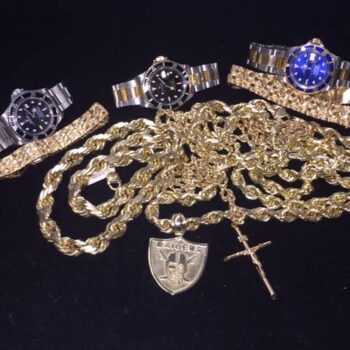 Gold jewelry watches collection display