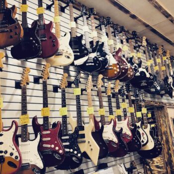 Wall display of electric guitars