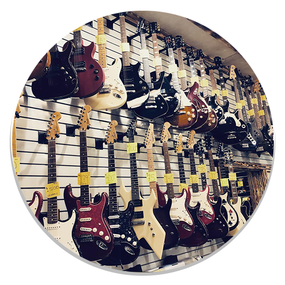 Guitars displayed in pawn shop